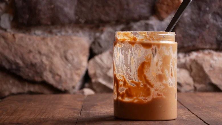 11 Clever Ways To Repurpose Old Peanut Butter Jars Around Your Home & Garden
