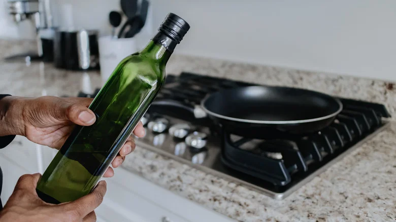 13 Unexpected Ways To Repurpose Olive Oil Bottles In Your Home And Garden