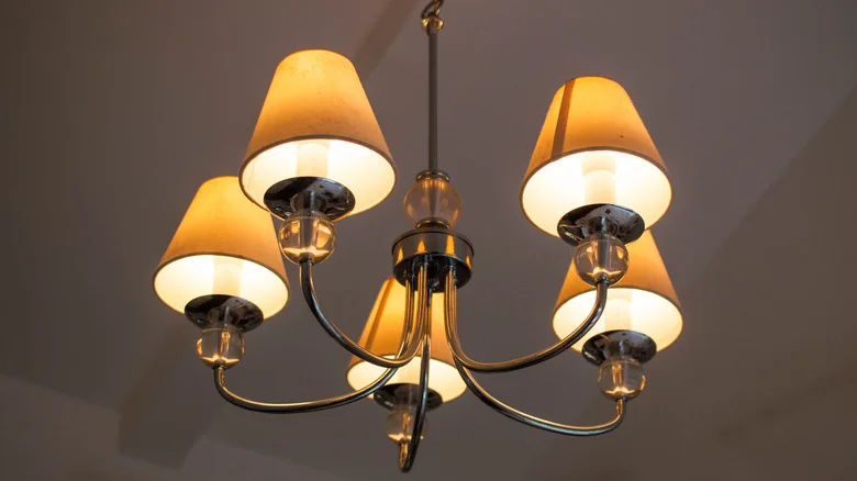 15 Gorgeous Ideas For Repurposing Old Light Fixtures In Your Home And Yard