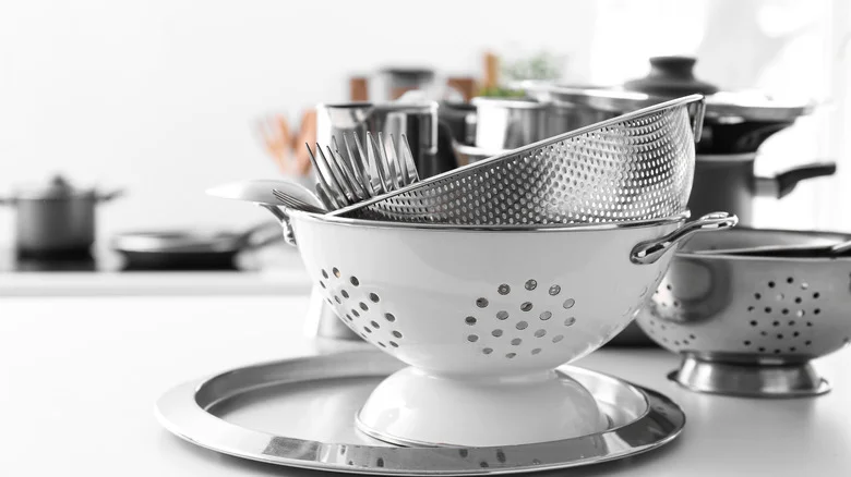 8 Smart Ways To Reuse An Old Colander In Your Garden