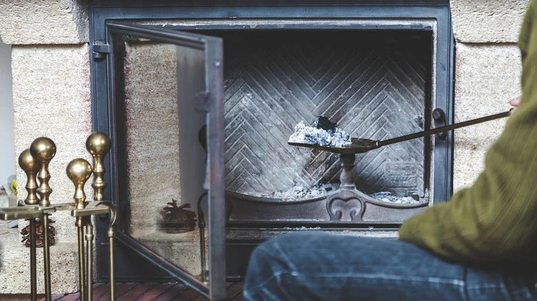 Can Your Fireplace Ash Really Help Melt The Snow In Your Yard And On Your Driveway?