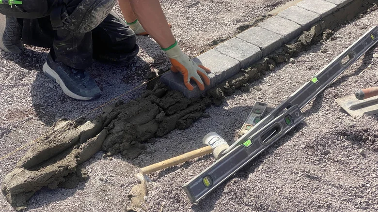 Ditch Pricey Natural Stone & Meet The Stylish Driveway Edging You Can Install On A Budget
