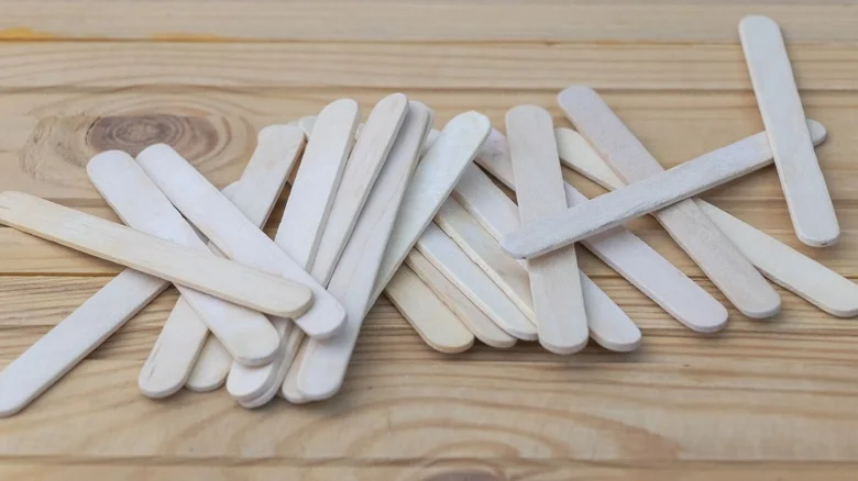 Don’t Throw Out Popsicle Sticks Without Trying This Adorable DIY Birdhouse