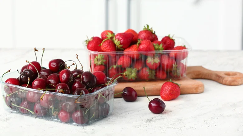 Don’t Toss Leftover Containers, Reuse Them For A Clever Grass Seed Spreading Hack