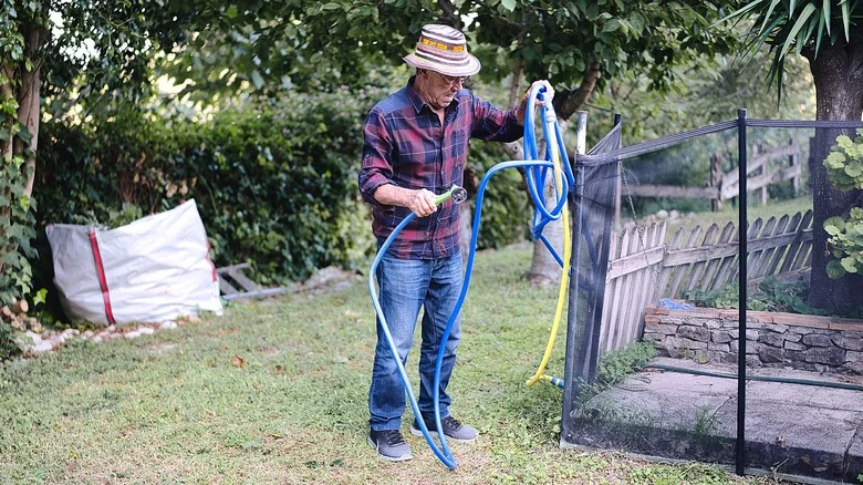 Keep Garden Hoses Organized With A Clever Battery-Powered Find From Amazon