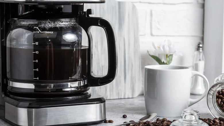 The Brilliant Reason Plant Lovers Should Be Collecting Second-Hand Coffee Pots