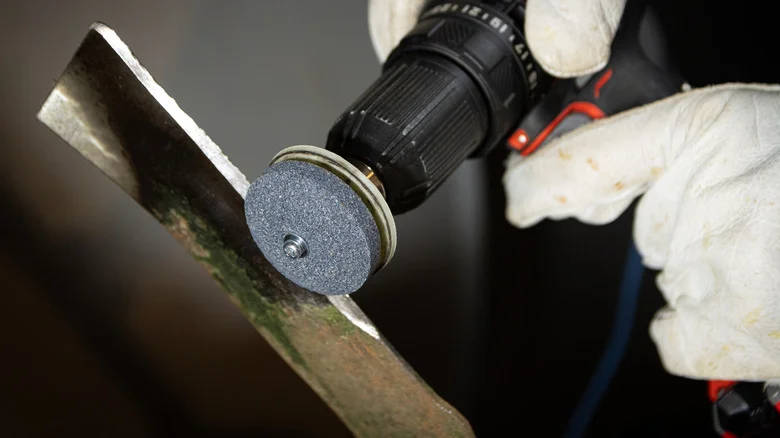 The Genius Trick You Need For An Easier Time Sharpening Lawn Mower Blades