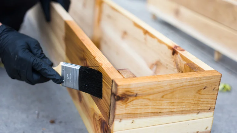 The Surprising Reason You Might Not Want To Seal Your Wood Planters