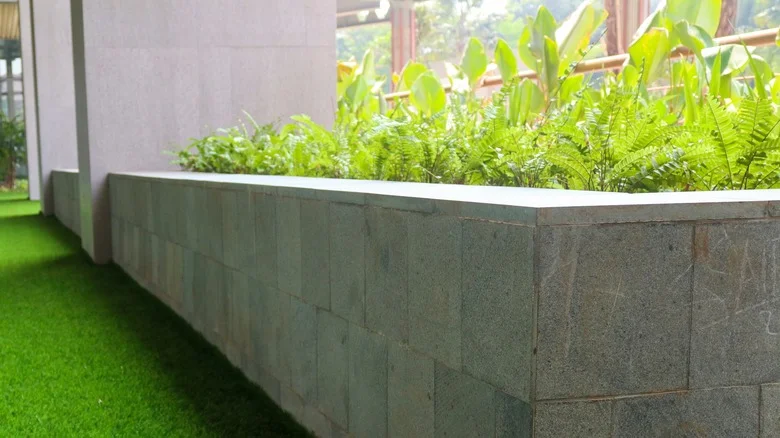 Try TikTok’s Cinder Block & Glue Raised Garden Bed For A DIY That Will Last