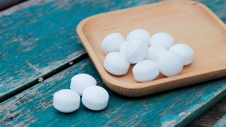Why You Should Reconsider Using Mothballs To Deter Critters From Your Bird Feeder