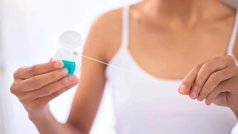 Why You Should Stash A Pack Of Dental Floss With Your Gardening Supplies