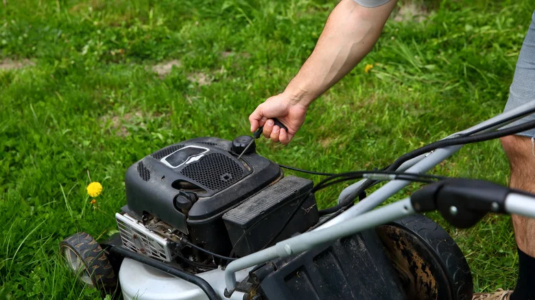 Why Your Lawn Mower Pull Cord Is Getting Stuck (And Tips To Fix It)